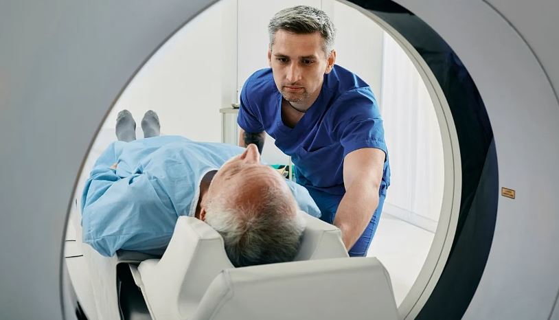 Man receiving prostate imaging scan for AI-assisted prostate cancer diagnosis